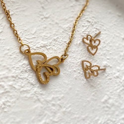 نیم ست گردنبند و گوشواره سه قلب طلایی استیل